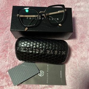 Philipp Plein Eyeglass VPP036s Black frame w/gold crystal skull temple accents.